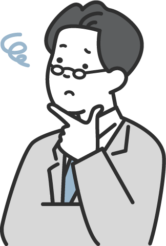 悩んでいるスーツの男性